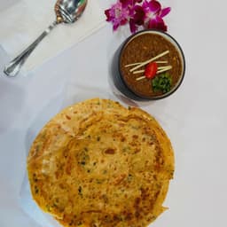 Chur Chur Paratha With Dal Makhni